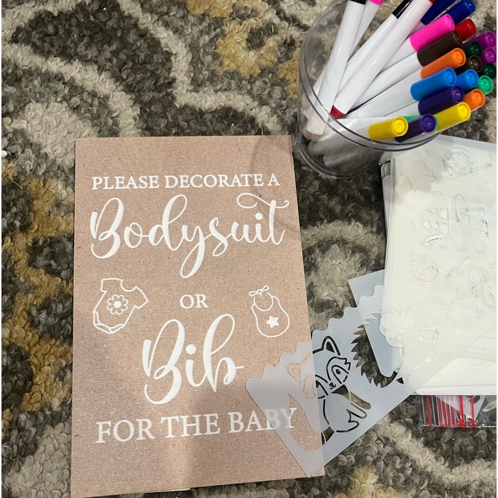 Baby shower game/activity, onesies and bib painting.